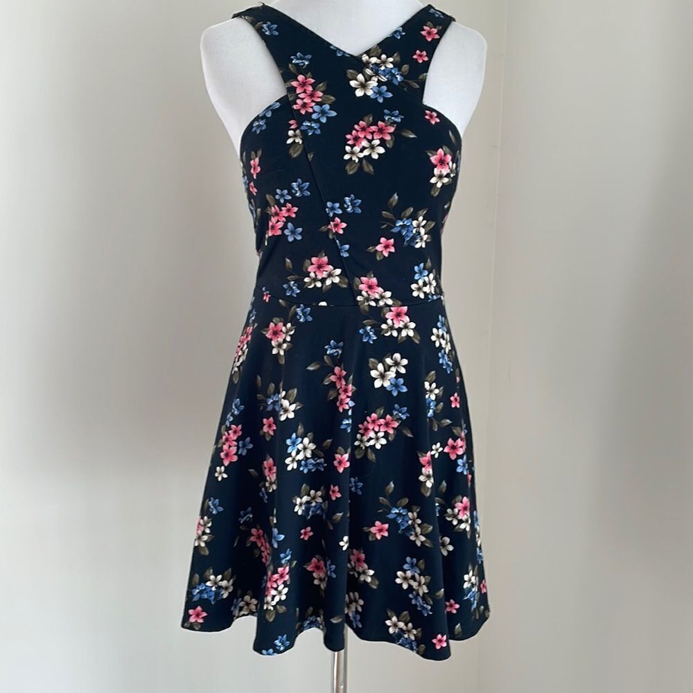 Mini dress by Hollister size small black with pink blue and white flowers